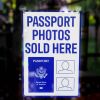 Passport Photos Sold Here Sign - Includes 2 Suction Cup Mounts 