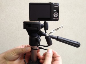 Scure your digital passport camera USB cable to the tripod