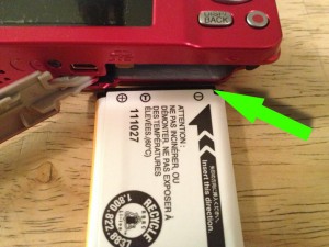 Match up the 3 icons on the Fuji battery for proper alignment