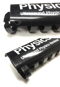 Lock tabs on larger diameter binding combs